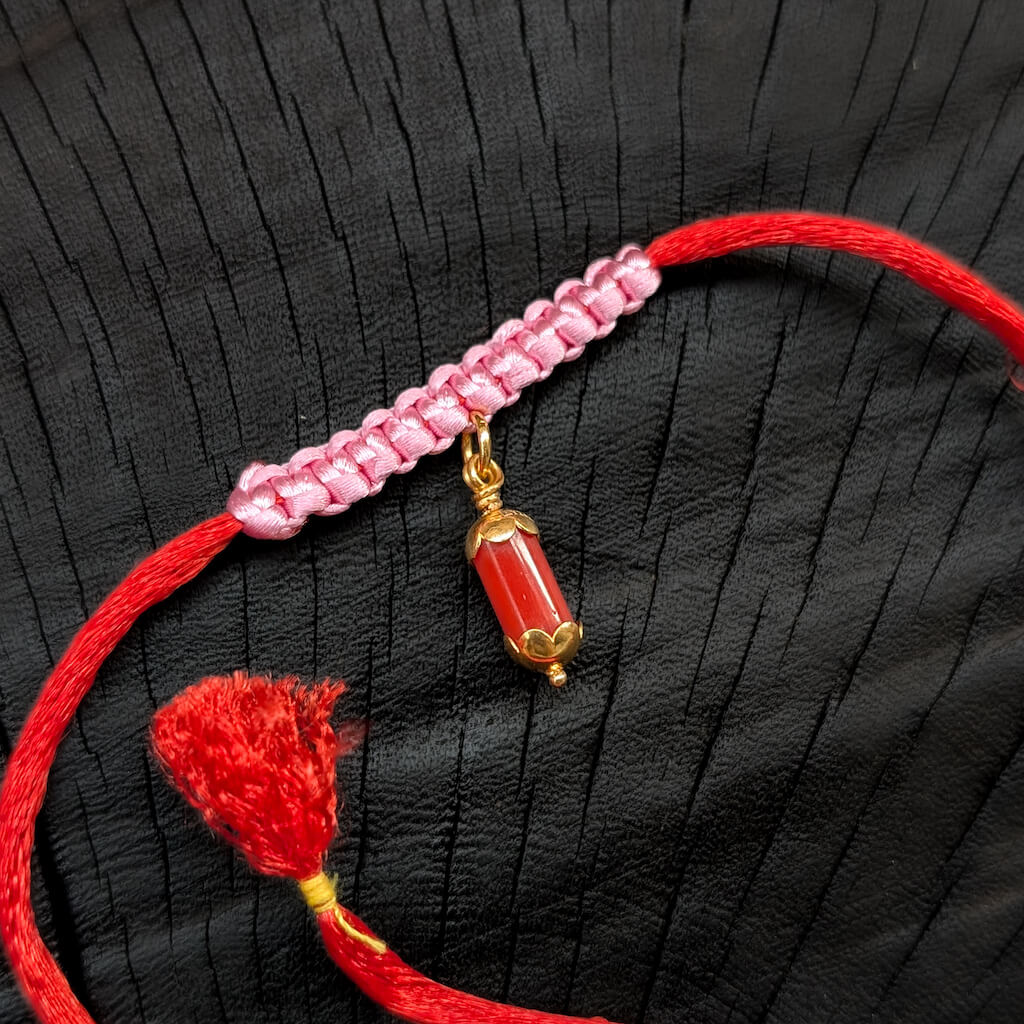 Rakhi Cum Pendant - SL - Coral Flower Cap Rakhi Cum Pendant - SL - Coral Flower Cap